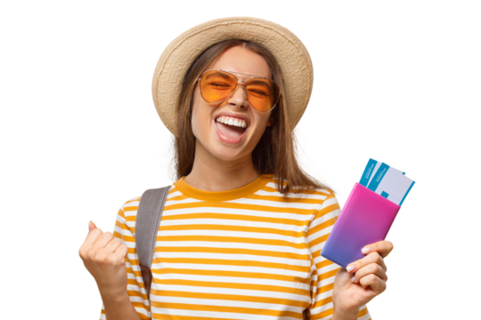 Excited young traveler celebrating her upcoming trip while holding passport and boarding passes - Powered by Adobe