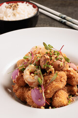 crispy fried chicken bites with lychee, mushrooms, red onion and peanuts served with steamed rice