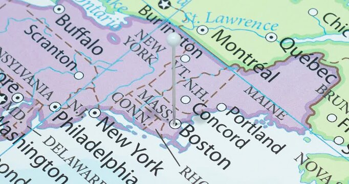 A zoom out of a white pin into a boston city of The United States of America political map