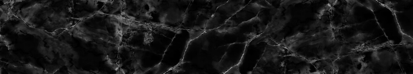 Dark black marble texture with subtle silver veins and deep cloudy gradients, showcasing elegant contrasts and natural stone sophistication for luxurious design themes.