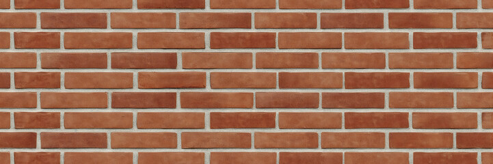 Close-up of red brick wall texture with mortar joints