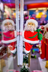 Christmas Santa decorations with vibrant colors and soft bokeh effect, creating a festive atmosphere and capturing the spirit of the holiday season in a joyful display