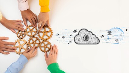 This image showcases diverse hands working together with gears and a cloud symbol, illustrating the essence of collaboration and innovation in a modern business environment. Raster