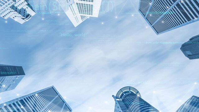 Stunning view of a modern urban skyline from below, showcasing towering skyscrapers against a vibrant blue sky, incorporating digital effects and futuristic themes. Xenic - Powered by Adobe