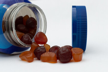 Men&rsquo;s Multivitamins with Blue Bottle on White Background. Daily Men&rsquo;s Multivitamins and Blue Container.