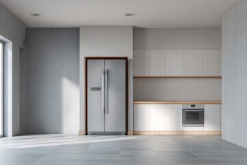 Fototapeta premium Modern, empty kitchen with stainless steel refrigerator and white cabinets.