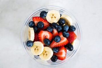 Vibrant Healthy Snack: Banana, Strawberry, Blueberry Fruit Salad - A Tasty, Nutritious Vegan Treat!