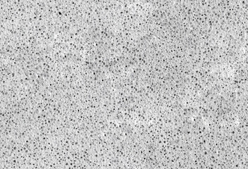 Seamless gray foam concrete background with tiny holes