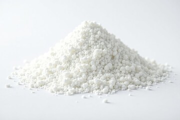 Pile of white granulated sugar on white background, still life, granulated, unhealthy
