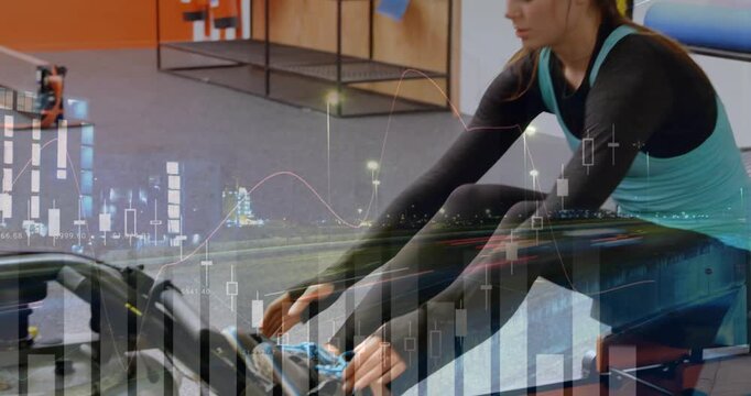 Woman bracing feet, pulling, rowing to train while semi-transparent financial charts tracking power