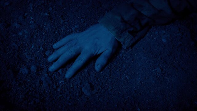 Arm On Ground In The Dark