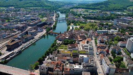 Naklejka premium An aerial panoramic view around the old town in the city Olten, in Switzerland on a sunny day in summer