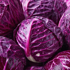 Close-up of a red cabbage showing layered purple leaves and intricate veins. Bright, clean composition perfect for culinary, farming, and healthy lifestyle visuals.