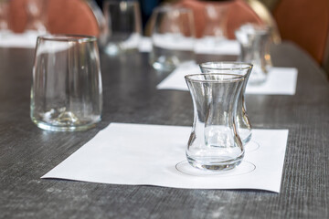 Empty glassware on table preparing for tasting event
