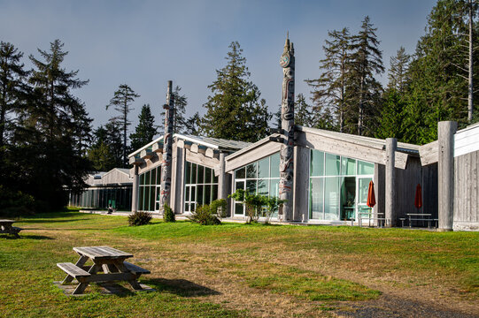 Skidegate, BC, Canada &ndash; September 2025: The Haida Heritage Centre at Kay Llnagaay featuring traditional totem poles and modern cedar architecture under a morning sky.