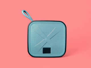 Teal Portable Speaker on Pink Background