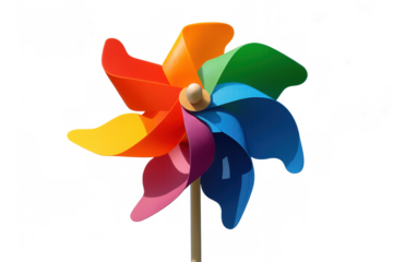 Colorful plastic pinwheel creating a rainbow visual, spinning with wind and symbolizing childhood play and freedom