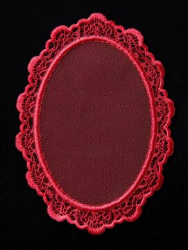Red lace doily vintage oval frame on black background