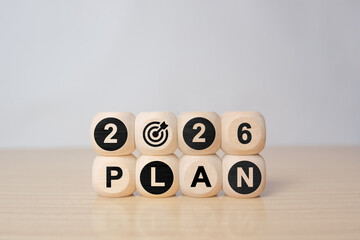 Wooden cubes block arranged as 2026 PLAN topic and concept
