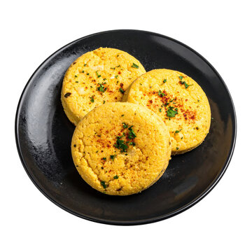 Sopa paraguaya a traditional paraguayan cornbread with cheese and onions sliced and served warm professionally isolated on white background