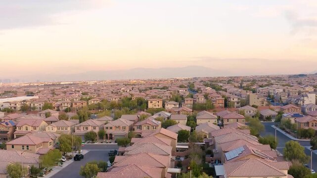 aerial drone fly over a modern residential property site for real estate housing society buildings, Las Vegas.