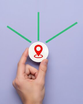 Hand with geolocation icon and new directions for next destinations. Navigation, exploring new destinations adn planning travel routes. GPS services and mapping travel guidance.