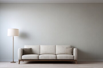 A modern living room features a neutral sofa with pillows and a floor lamp.