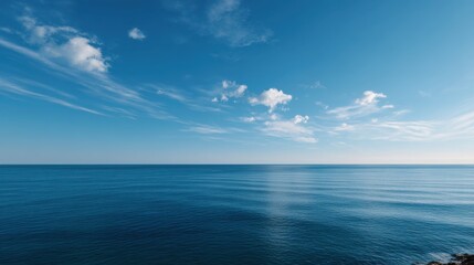 Obraz premium Serene Minimalist Horizon Where Sea Meets Sky in Tranquil Blue Tones