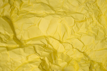 Crumpled Yellow Paper Texture: Artistic Wrinkle Paper Design for Unique Paper Art Creations, Perfect for Crafting and Creative Projects on unique Background.