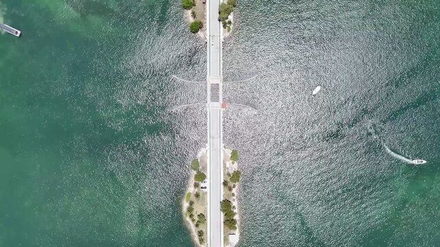 Aerial view of Miami skyline and waterfront islands over turquoise Biscayne Bay in sunny Florida, USA. g.