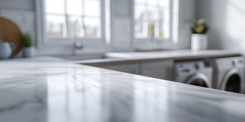 A modern kitchen interior highlighting a sleek marble countertop with laundry machines visible in the background. Ideal for home decor.