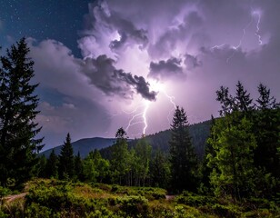 Dramatic nighttime landscape, lightning strikes over dark mountains and trees