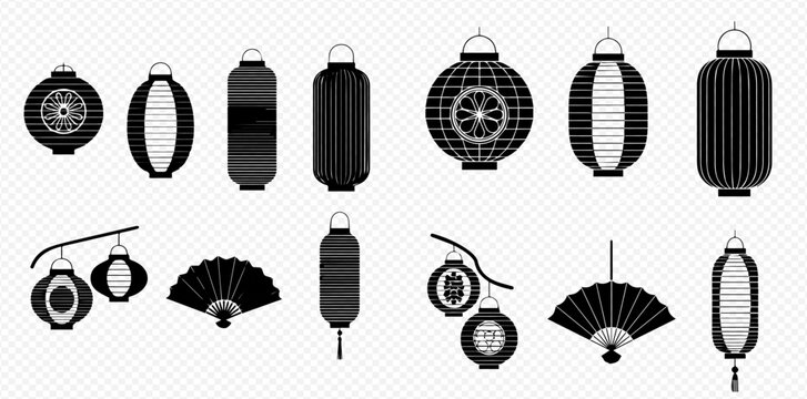 Set of various black and white Asian lanterns and traditional fans for decoration.
