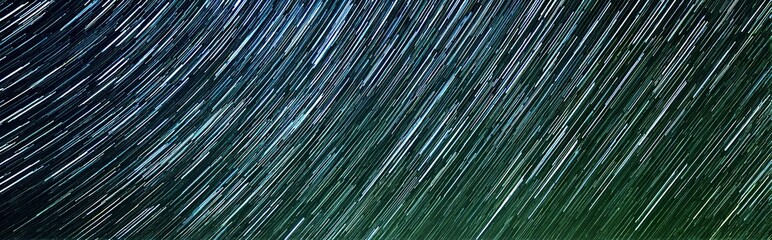 Close-up of Blue-Green Star Trail Night Sky - Dreamy Astronomical Landscape Material

