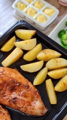 Roasted Chicken and Potato Wedges on Tray