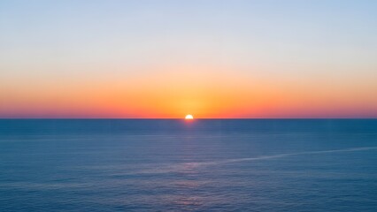 Obraz premium Beautiful sunset over the calm ocean