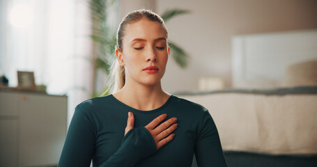 Breathing, yoga and zen with woman in home for meditation, chakra and fitness. Balance, calm and...
