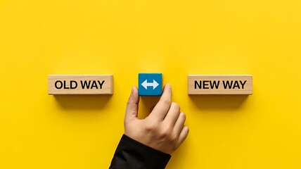 Hand choosing new way over old way with arrow button on yellow background