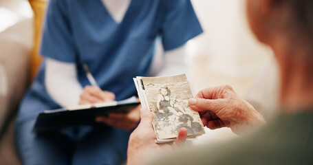 House, memory and old woman in lounge, picture and nostalgia with love, wonder and thinking. Apartment, nurse or senior person with photography, retirement and mourning death with history or remember