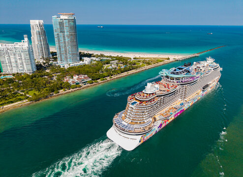 Miami, Florida, USA - April 16, 2025: NCL. Norwegian Aqua cruise ship voyage. Cruise in summer vacation. Norwegian cruise line. Cruise ship tour. Travel at sea. Ship leaving Miami beach port