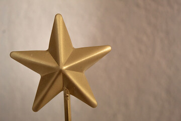 golden star on a wooden background