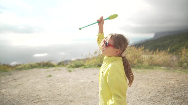 Juggling Gymnastics Mountain Energetic Girl Performs Clubs Routine Vertical video