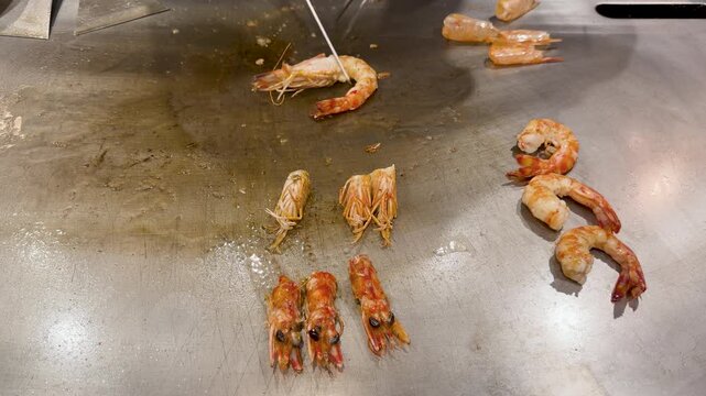 Barbecue meat on the grill. Grill chef searing steak on an open flame grill