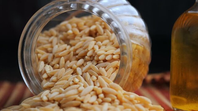 Cooking with orzo and olive oil in the kitchen