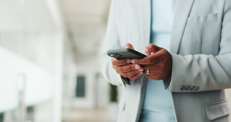 Hands, cellphone and businessman in office for email, communication or contact for finance deal. Technology, typing and male financial manager with phone for investment proposal on app in workplace.