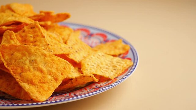 Crunchy snack on a blue patterned plate in kitchen
