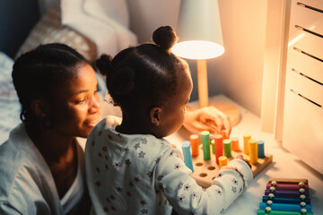 Obraz premium Mother and child playing together