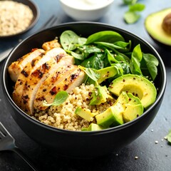 Grilled chicken, quinoa, avocado, and spinach salad