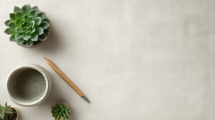 Minimalist workspace flat lay from above with vast empty space, beige linen texture, small succulent plant, wooden pen, white mug, zen aesthetic