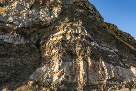 （Tvs）Early Miocene Vaqueros Formation, sandstone, with diabase and mafic hypabyssal intrusive rocks of gabbroic and dioritic composition.  near Point Mugu Rock, Santa Monica Mountains

